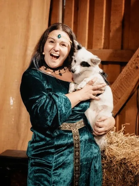 Christin and her dog Neyla acting on stage