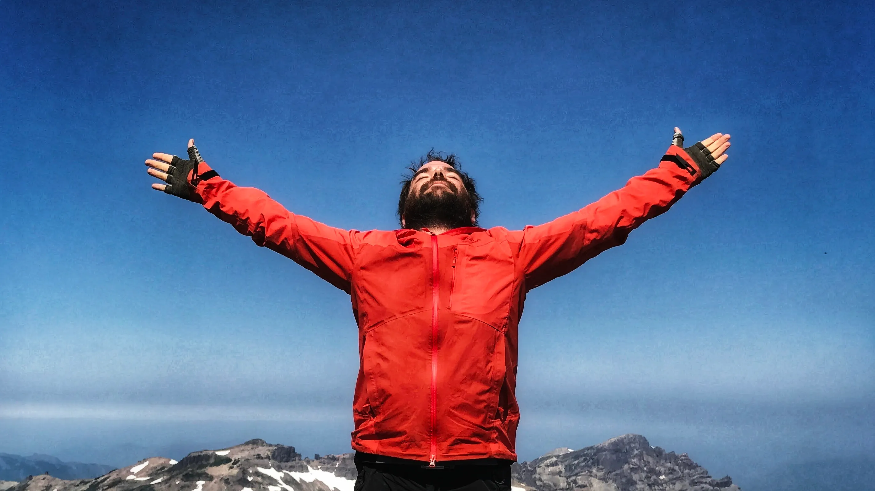 Thomas spreading his wings over the cascade mountains on old snowy
